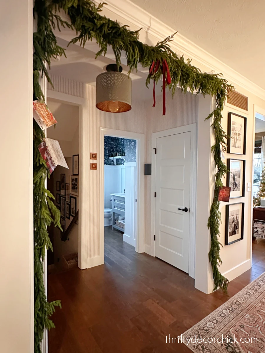 pine garland around large doorway